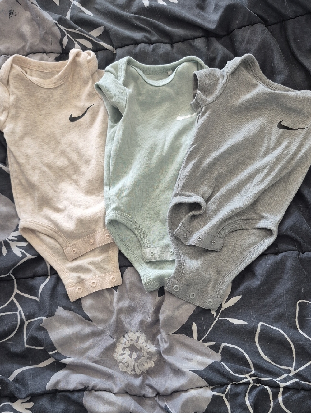 Nike Baby Bodysuit Trio in Beige, Sage, and Heather Gray